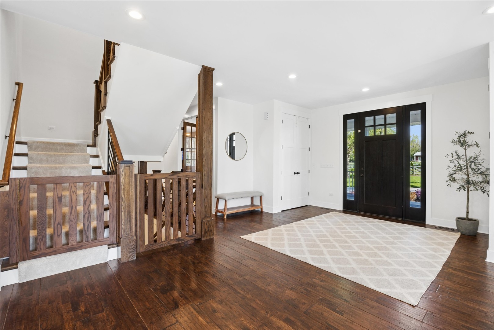 16W185 89th Street Burr Ridge, IL 60527 - Photo 5 of 44 a view of an empty room with wooden floor