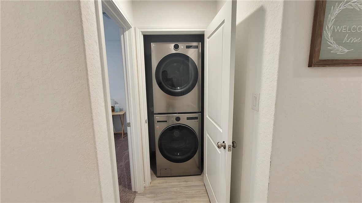 3206 Lancer Street Robstown, TX 78380 - Photo 21 of 23 a close view of a utility room with washer and dryer