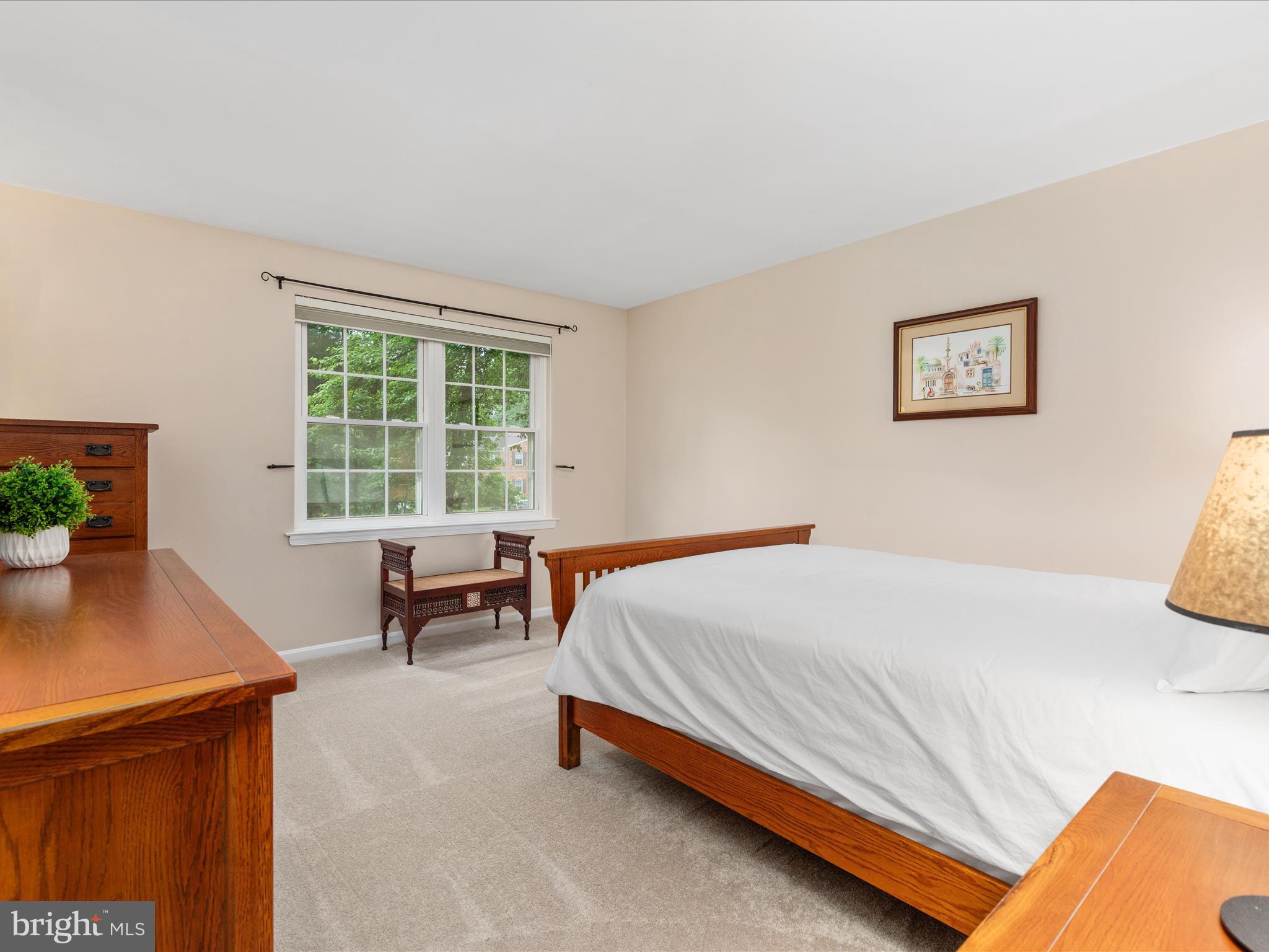 2272 Gunsmith Square Reston, VA 20191 - Photo 13 of 63 a bedroom with a bed and a table