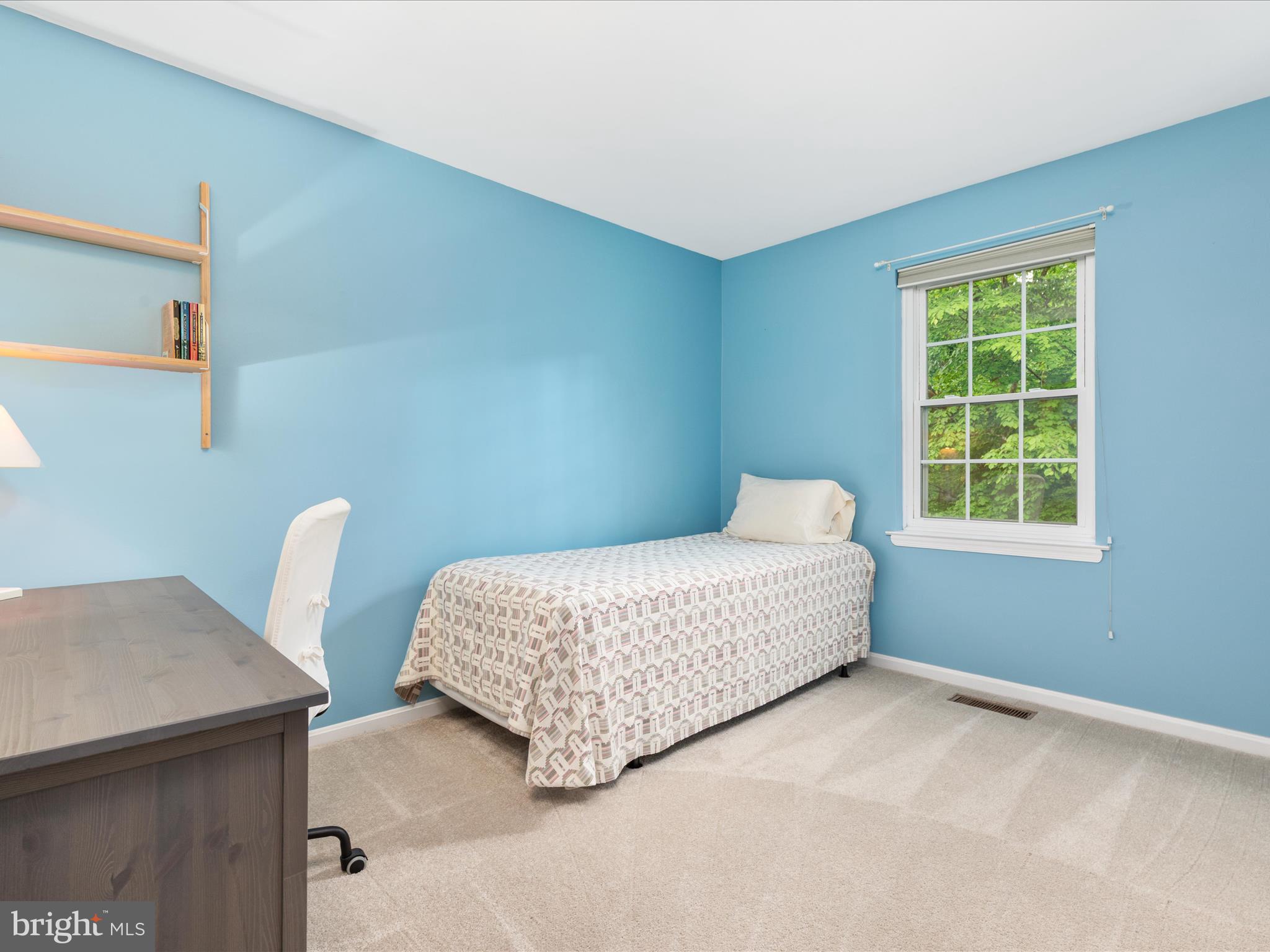 2272 Gunsmith Square Reston, VA 20191 - Photo 15 of 63 a bedroom with a bed chair and window