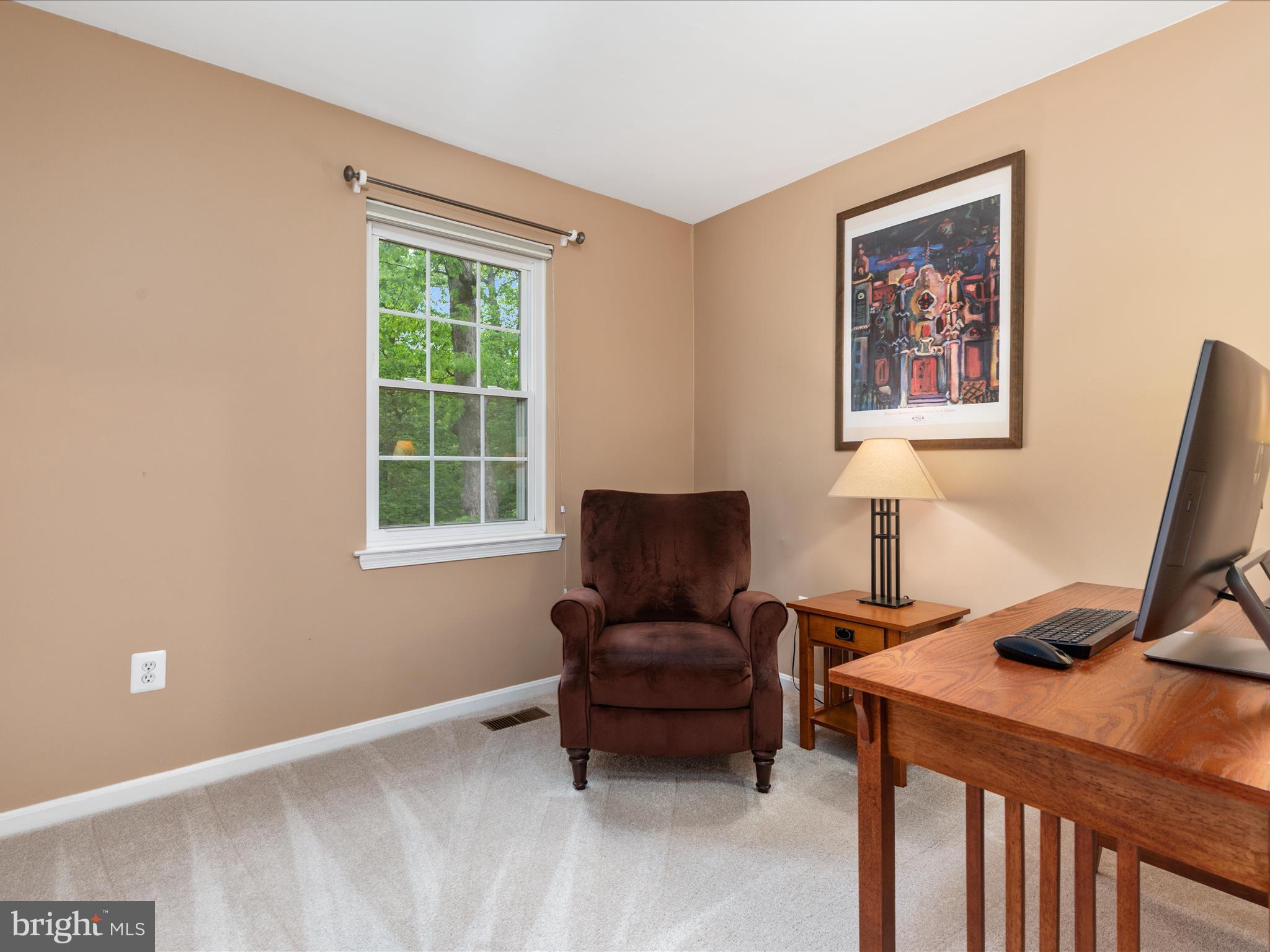 2272 Gunsmith Square Reston, VA 20191 - Photo 16 of 63 a living room with furniture and a window