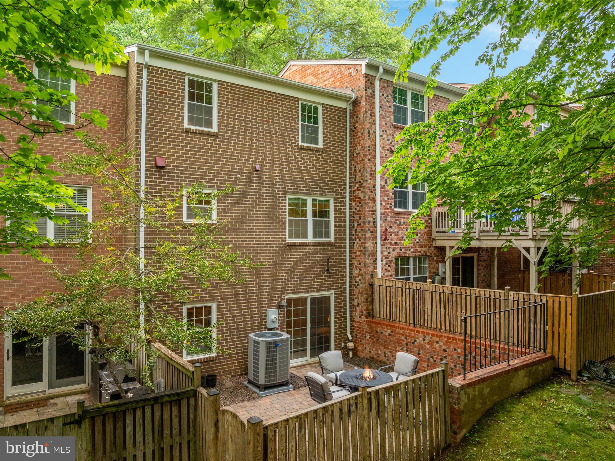 2272 Gunsmith Square Reston, VA 20191 - Photo 24 of 63 a view of a house with backyard and sitting area