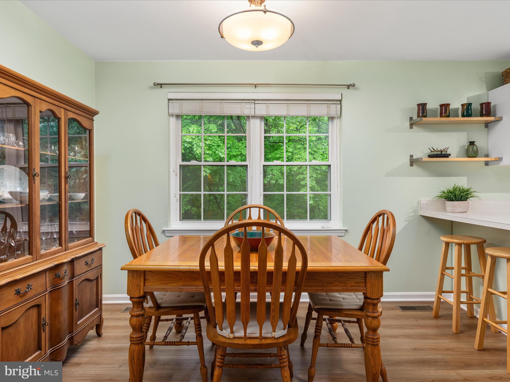 2272 Gunsmith Square Reston, VA 20191 - Photo 7 of 63 a view of a dining room with furniture and wooden floor
