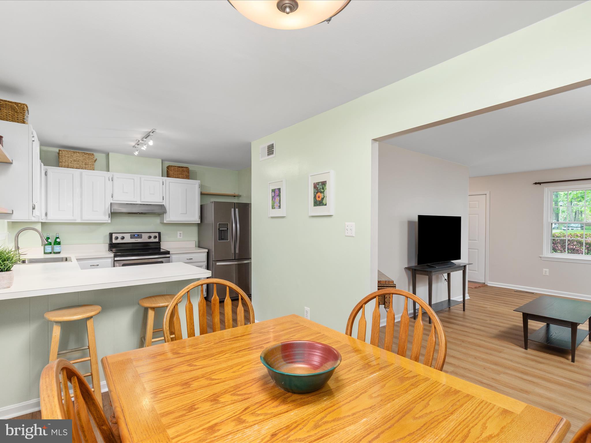 2272 Gunsmith Square Reston, VA 20191 - Photo 8 of 63 Dining Room + Kitchen | Main Level