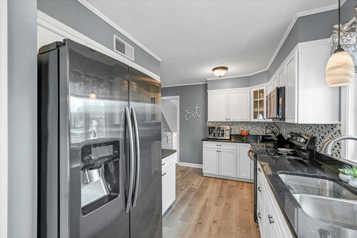 6 Broadview Road Poughkeepsie, NY 12603 - Photo 17 of 35 a kitchen with a refrigerator a sink and cabinets