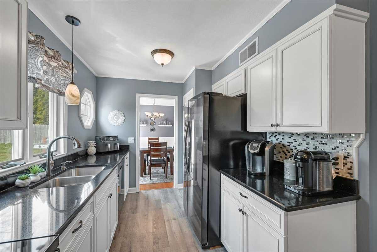 6 Broadview Road Poughkeepsie, NY 12603 - Photo 18 of 35 a kitchen with stainless steel appliances a sink stove and refrigerator