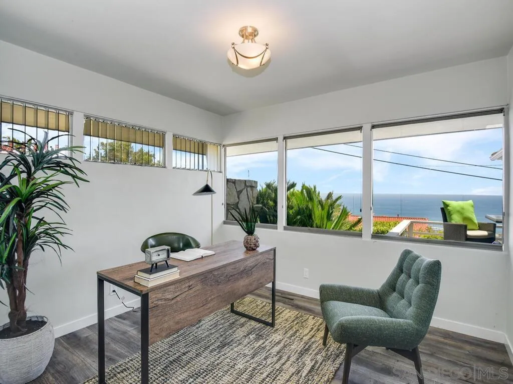 1010 La Jolla Rancho Road La Jolla, CA 92037 - Photo 13 of 35 a living room with furniture and a potted plant