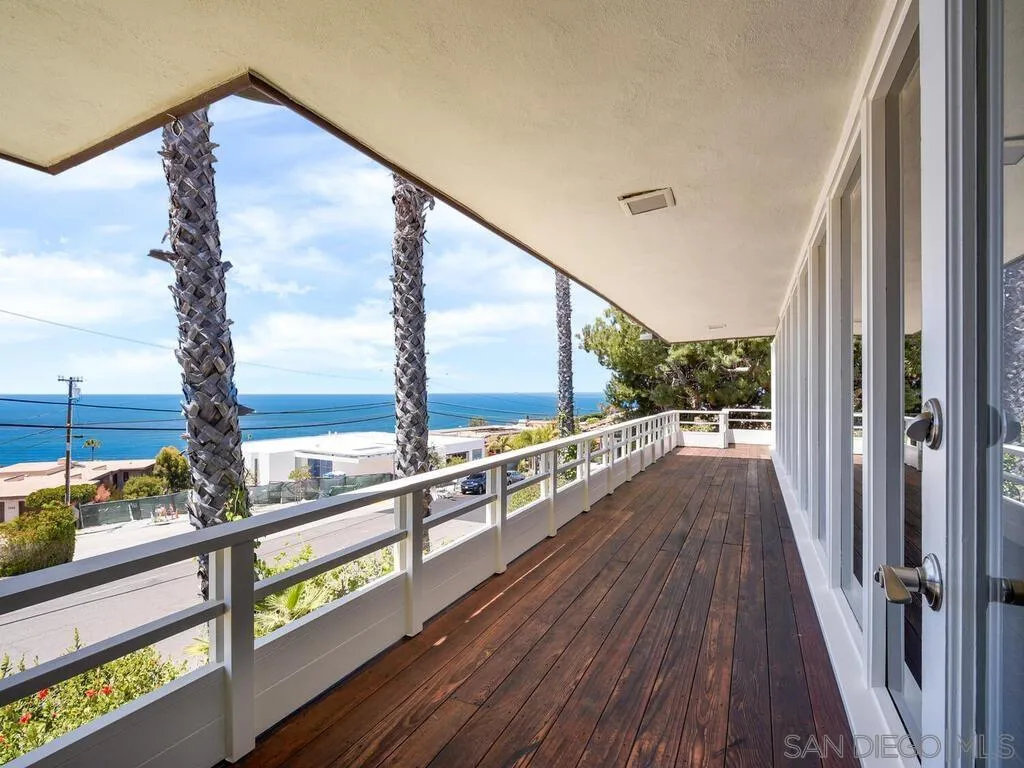 1010 La Jolla Rancho Road La Jolla, CA 92037 - Photo 26 of 35 a view of a balcony with wooden floor