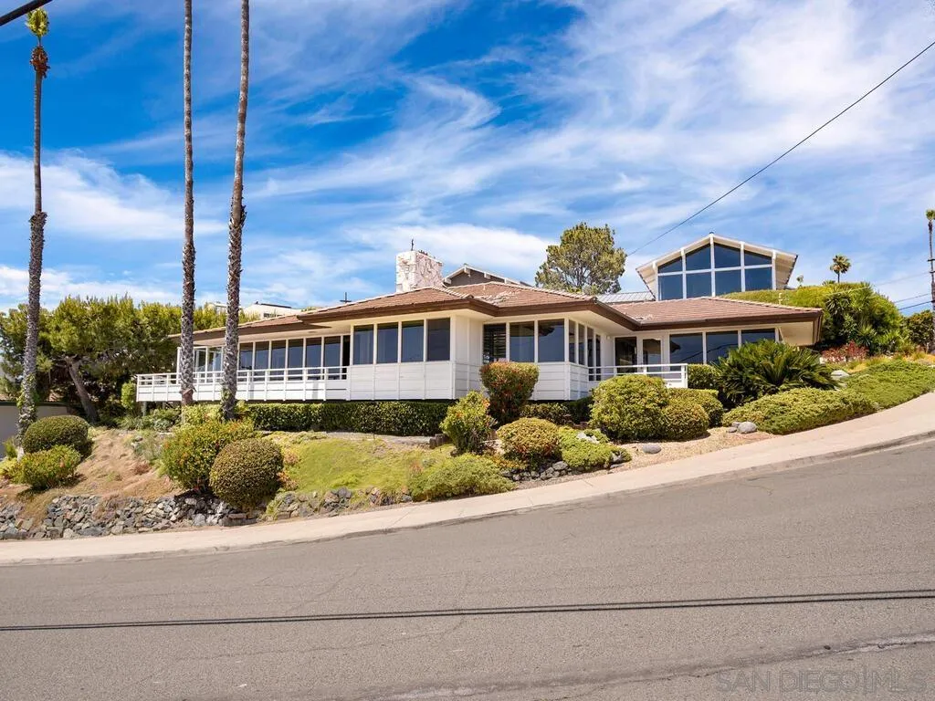 1010 La Jolla Rancho Road La Jolla, CA 92037 - Photo 28 of 35 a front view of a house with a garden