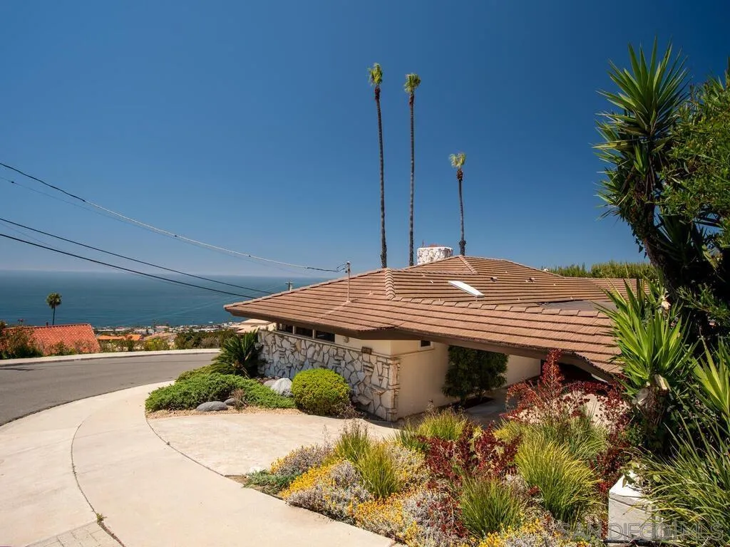 1010 La Jolla Rancho Road La Jolla, CA 92037 - Photo 29 of 35 a view of an house with a yard