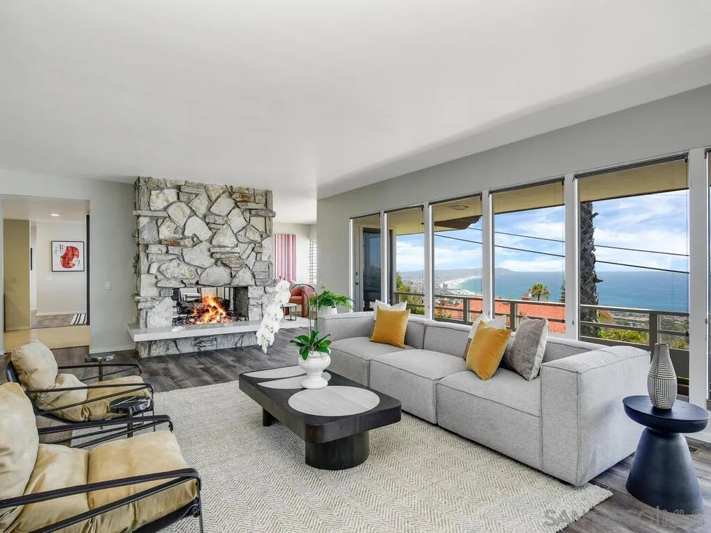 1010 La Jolla Rancho Road La Jolla, CA 92037 - Photo 3 of 35 a living room with furniture and a large window