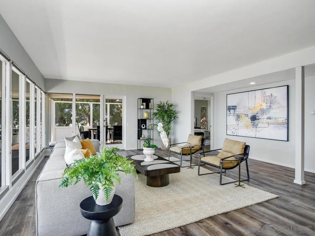 1010 La Jolla Rancho Road La Jolla, CA 92037 - Photo 34 of 35 a living room with furniture flowerpot and wooden floor