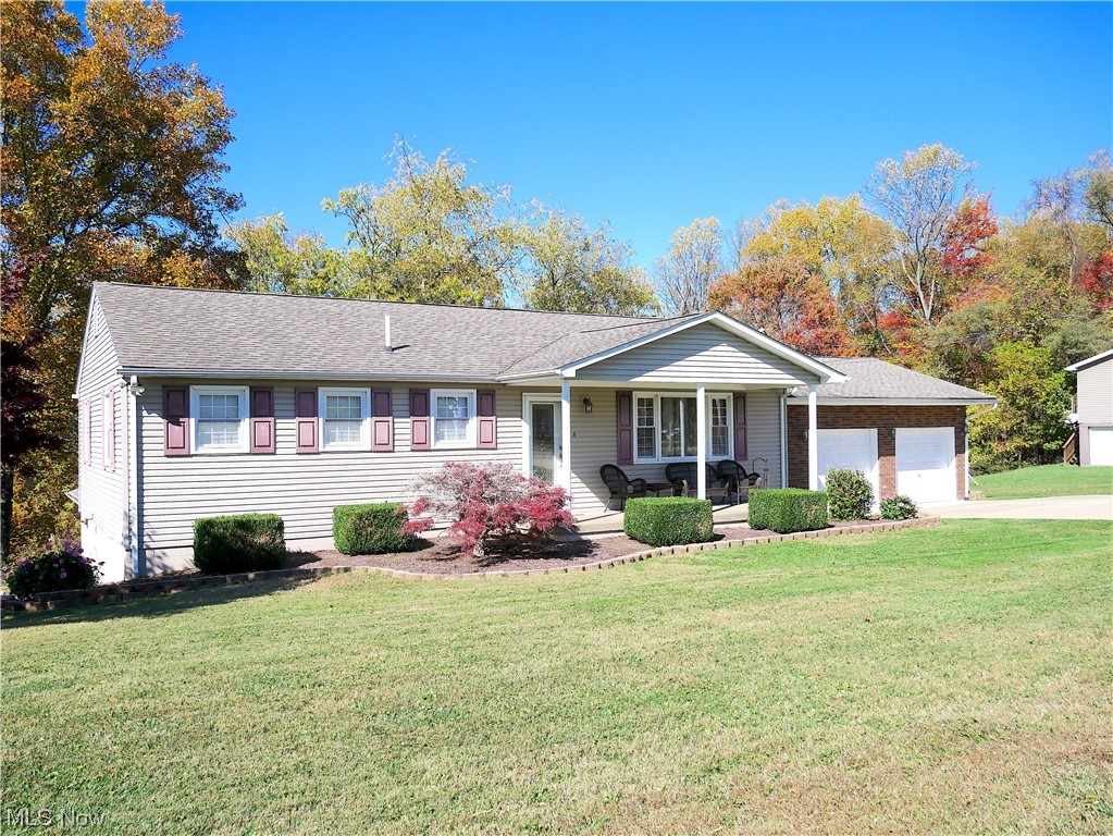 62818 Chestnut Road Bellaire, OH 43906 - Photo 3 of 18 Ranch-style home with a front lawn and a garage