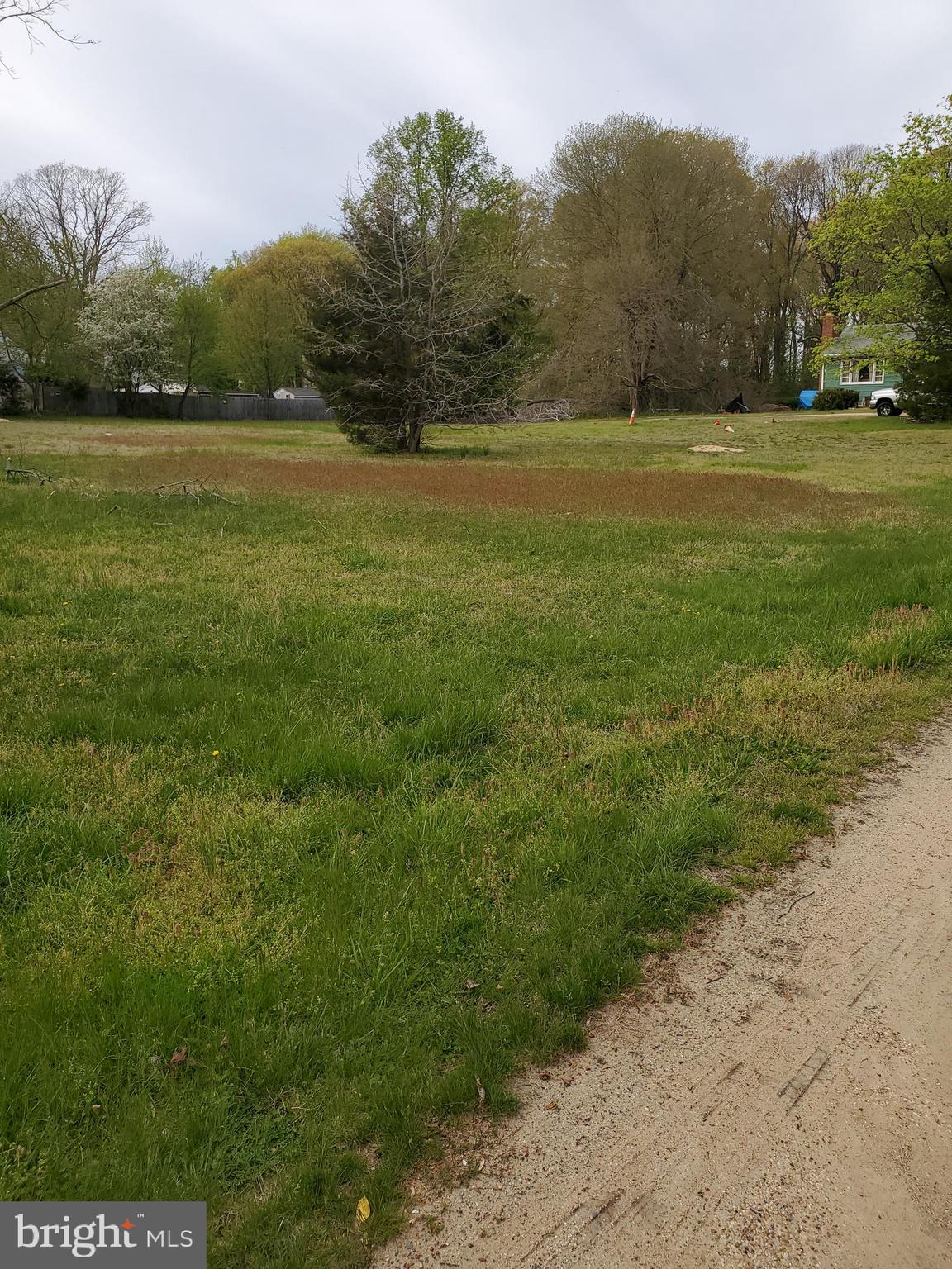 927 Old Annapolis Neck Road Annapolis, MD 21403 - Photo 2 of 9 a view of field with large trees