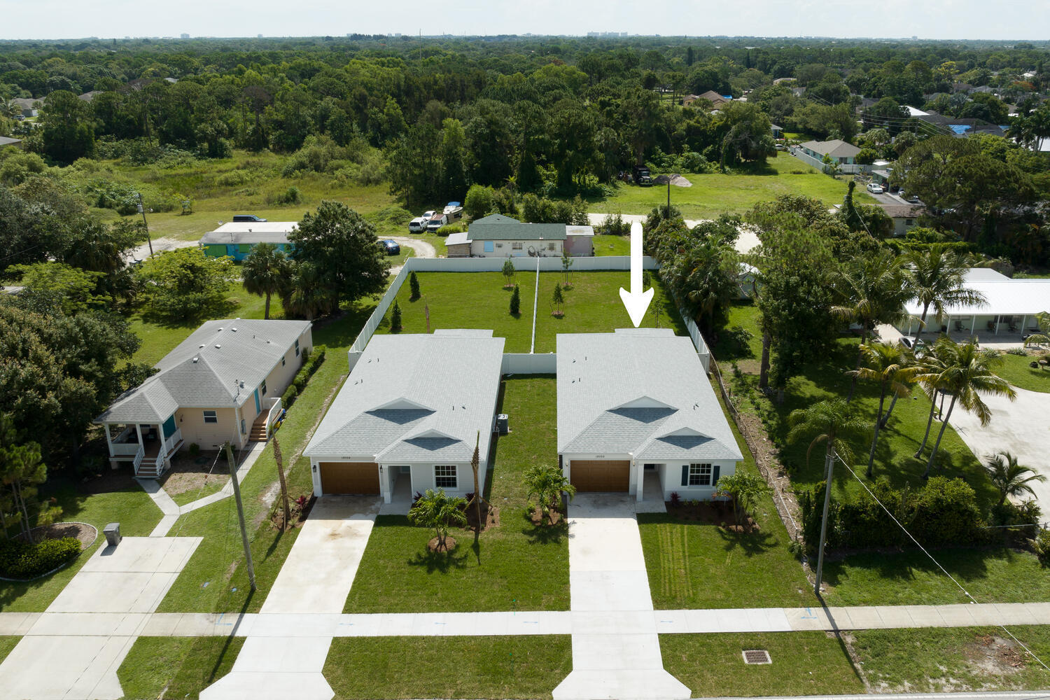 18050 Limestone Creek Road Jupiter, FL 33458 - Photo 25 of 26 an aerial view of a house with big yard