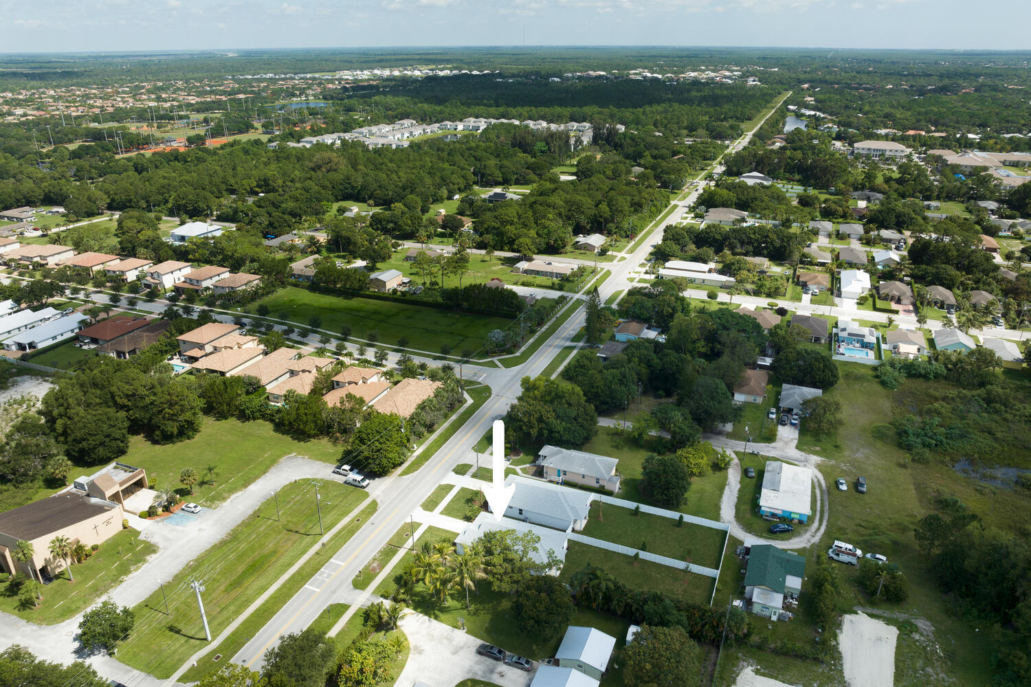 18050 Limestone Creek Road Jupiter, FL 33458 - Photo 26 of 26 an aerial view of residential houses with outdoor space and river