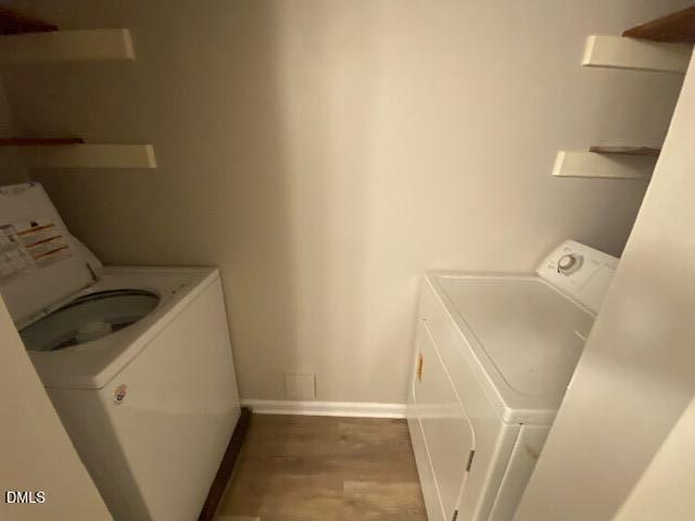 8129 McGuire Drive Raleigh, NC 27616 - Photo 12 of 14 a utility room with dryer and washer