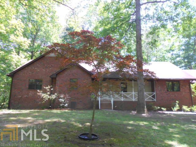 2555 New Lake Road Southwest Stockbridge, GA 30281 - Photo 1 of 1 a view of a yard in front of house