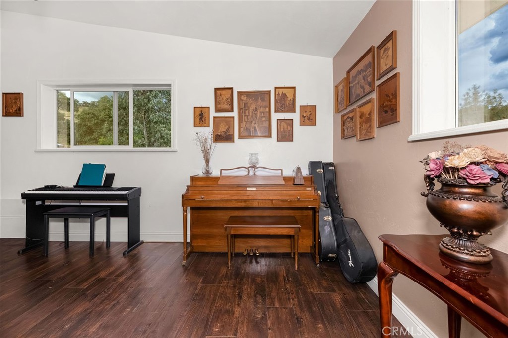 2728 Pentz Road Oroville, CA 95965 - Photo 14 of 52 a view of a workspace with furniture and wooden floor