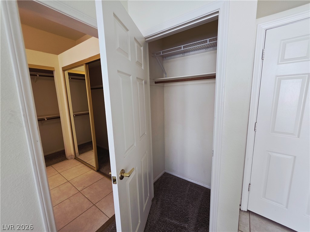 2920 Setting Sun Street Las Vegas, NV 89117 - Photo 26 of 43 This spacious closet offers ample storage and features convenient mirrored sliding doors.