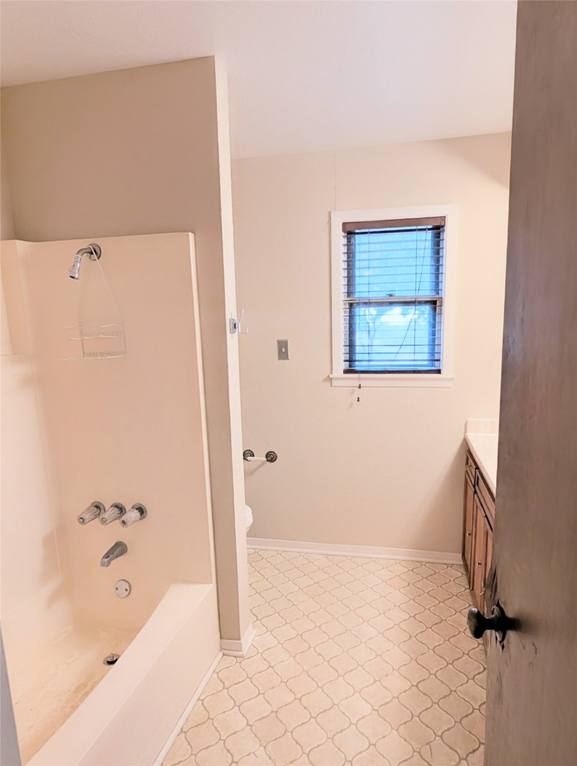 4779 Mixville Road Sealy, TX 77474 - Photo 19 of 37 a bathroom with a bathtub