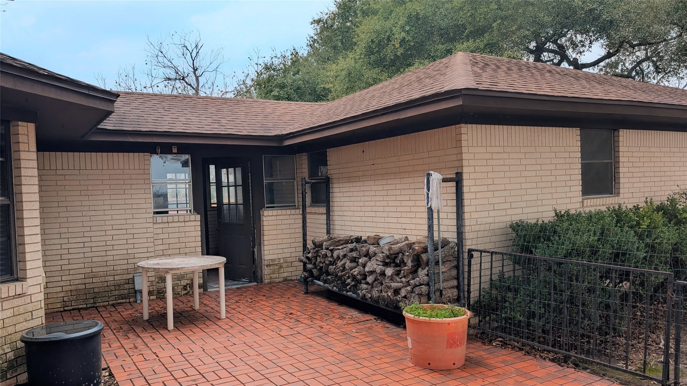 4779 Mixville Road Sealy, TX 77474 - Photo 31 of 37 a backyard of a house with table and chairs