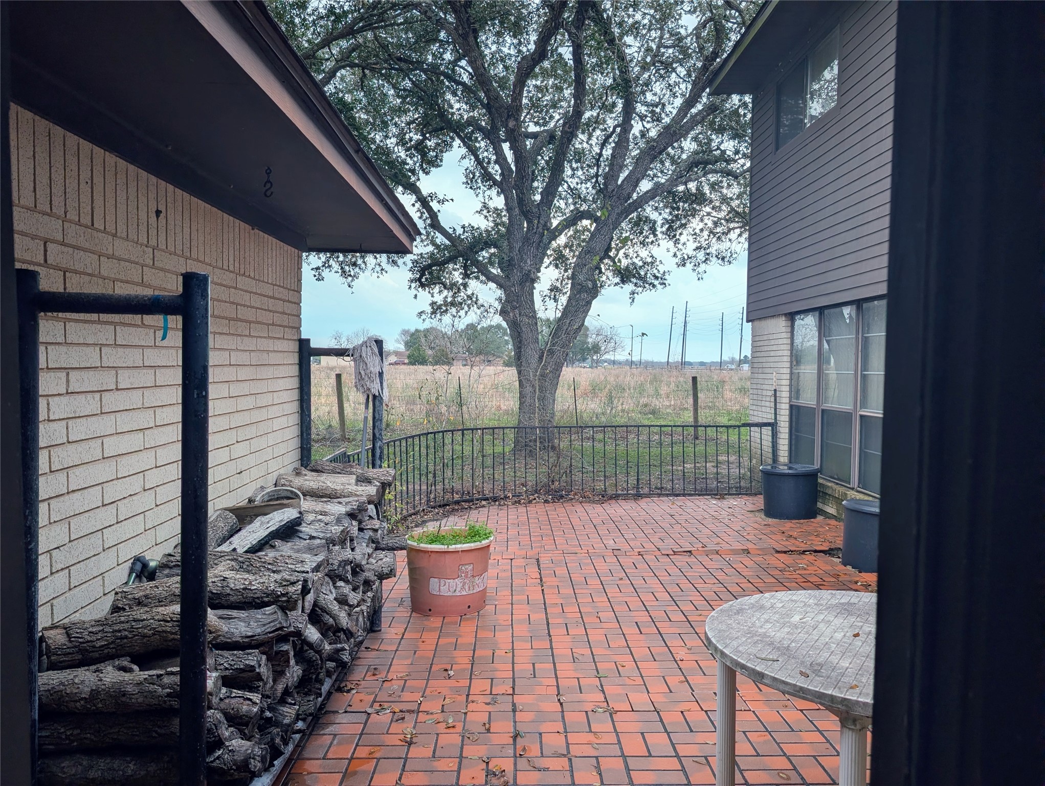 4779 Mixville Road Sealy, TX 77474 - Photo 32 of 47 a view of a backyard with sitting area