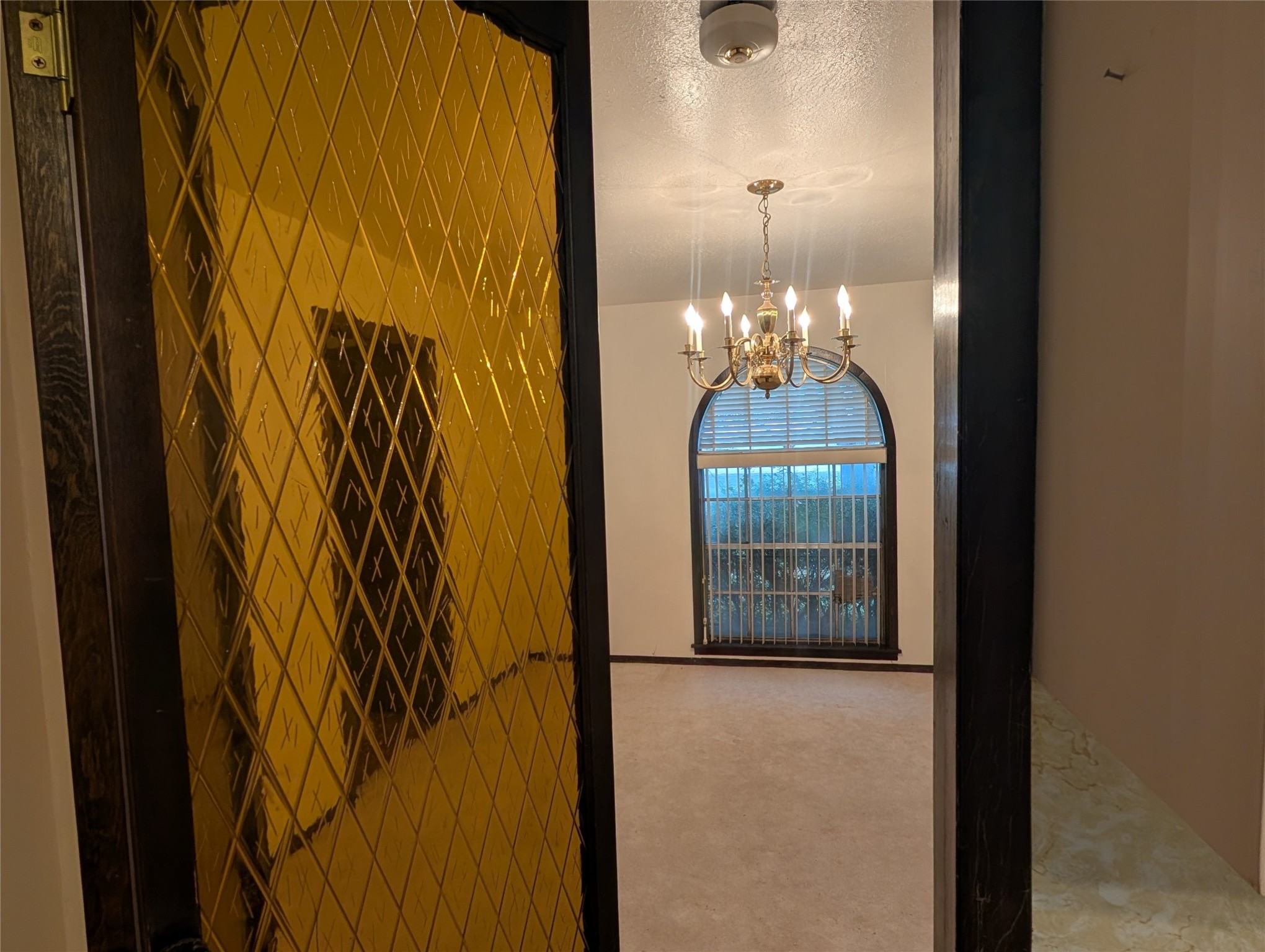 4779 Mixville Road Sealy, TX 77474 - Photo 8 of 37 a room with a chandelier