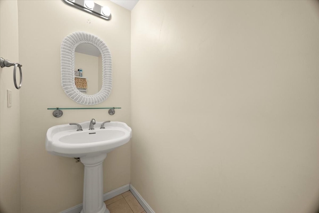 2697 Cranberry Highway, Unit 28 Wareham, MA 02571 - Photo 16 of 37 a bathroom with a sink and a mirror