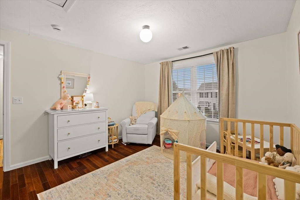 2697 Cranberry Highway, Unit 28 Wareham, MA 02571 - Photo 17 of 37 a bed room with a bed and a window