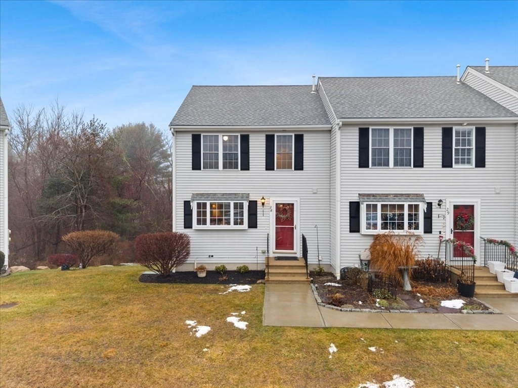 2697 Cranberry Highway, Unit 28 Wareham, MA 02571 - Photo 3 of 37 a front view of a house with swimming pool and glass windows