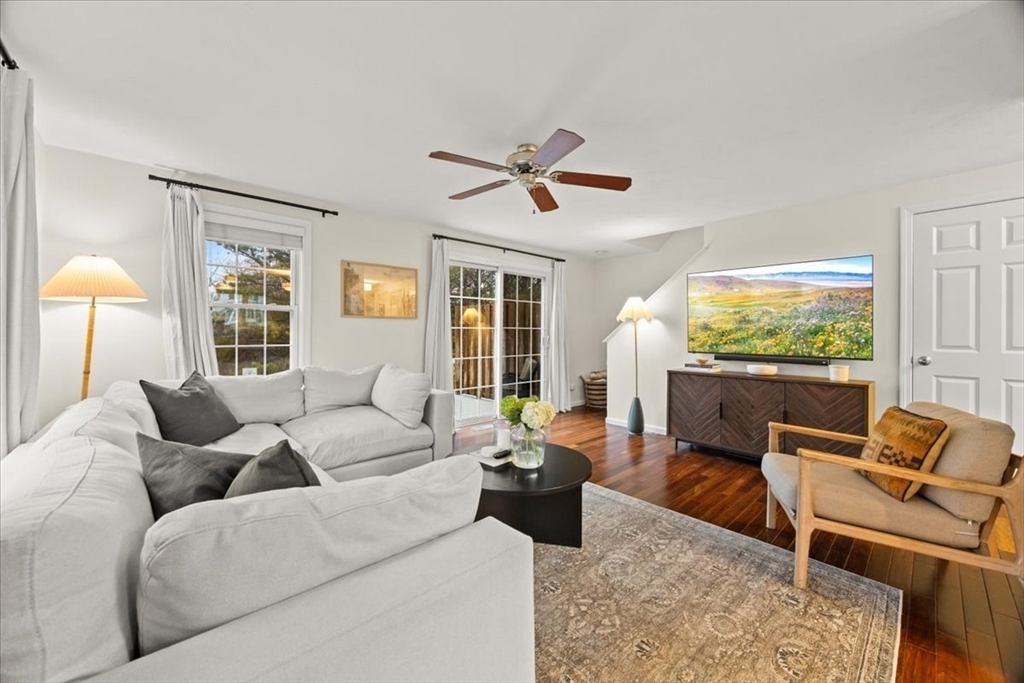 2697 Cranberry Highway, Unit 28 Wareham, MA 02571 - Photo 7 of 37 a living room with furniture and a flat screen tv