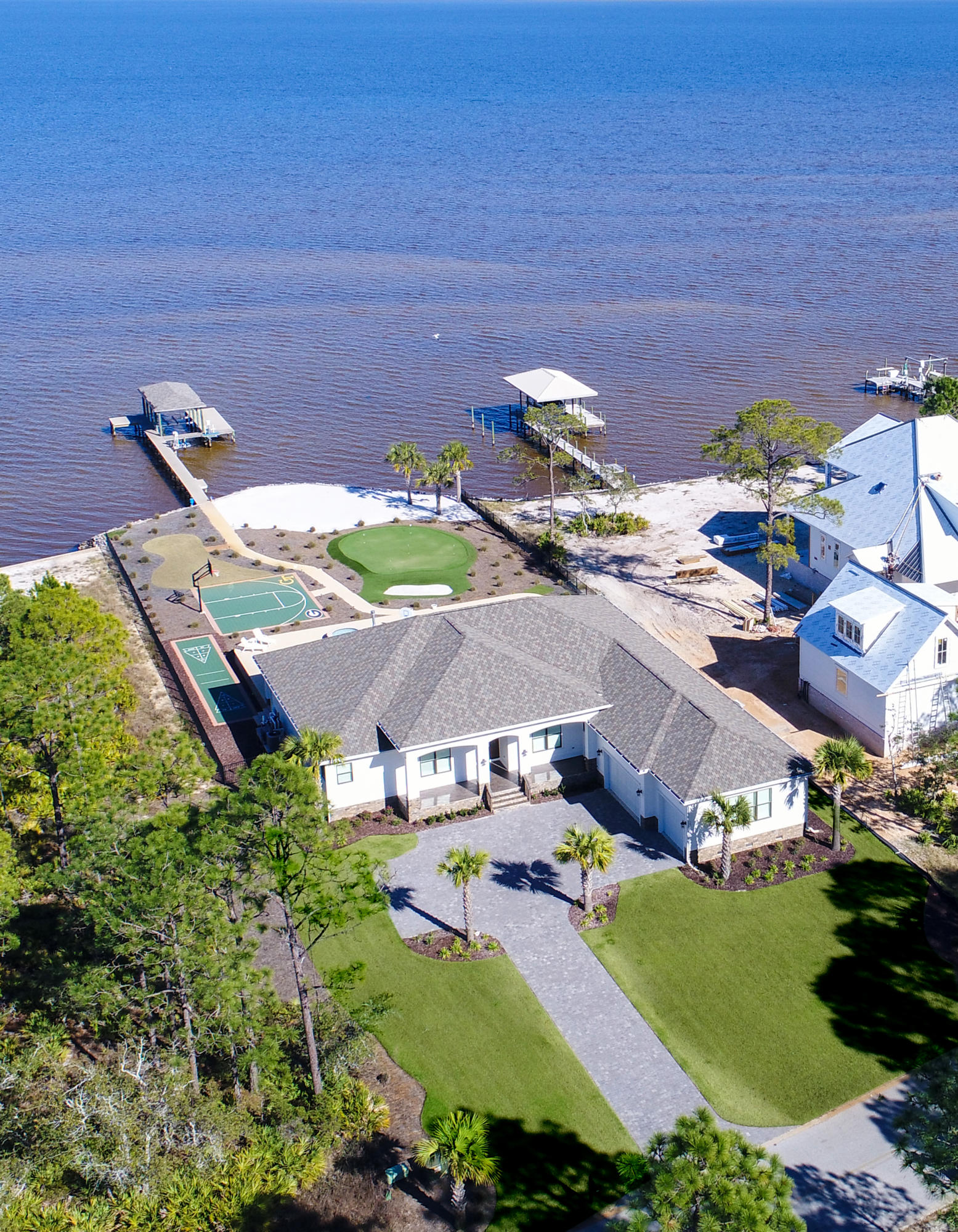 1591 Driftwood Point Road Santa Rosa Beach, FL 32459 - Photo 1 of 50 an aerial view of a house with outdoor space