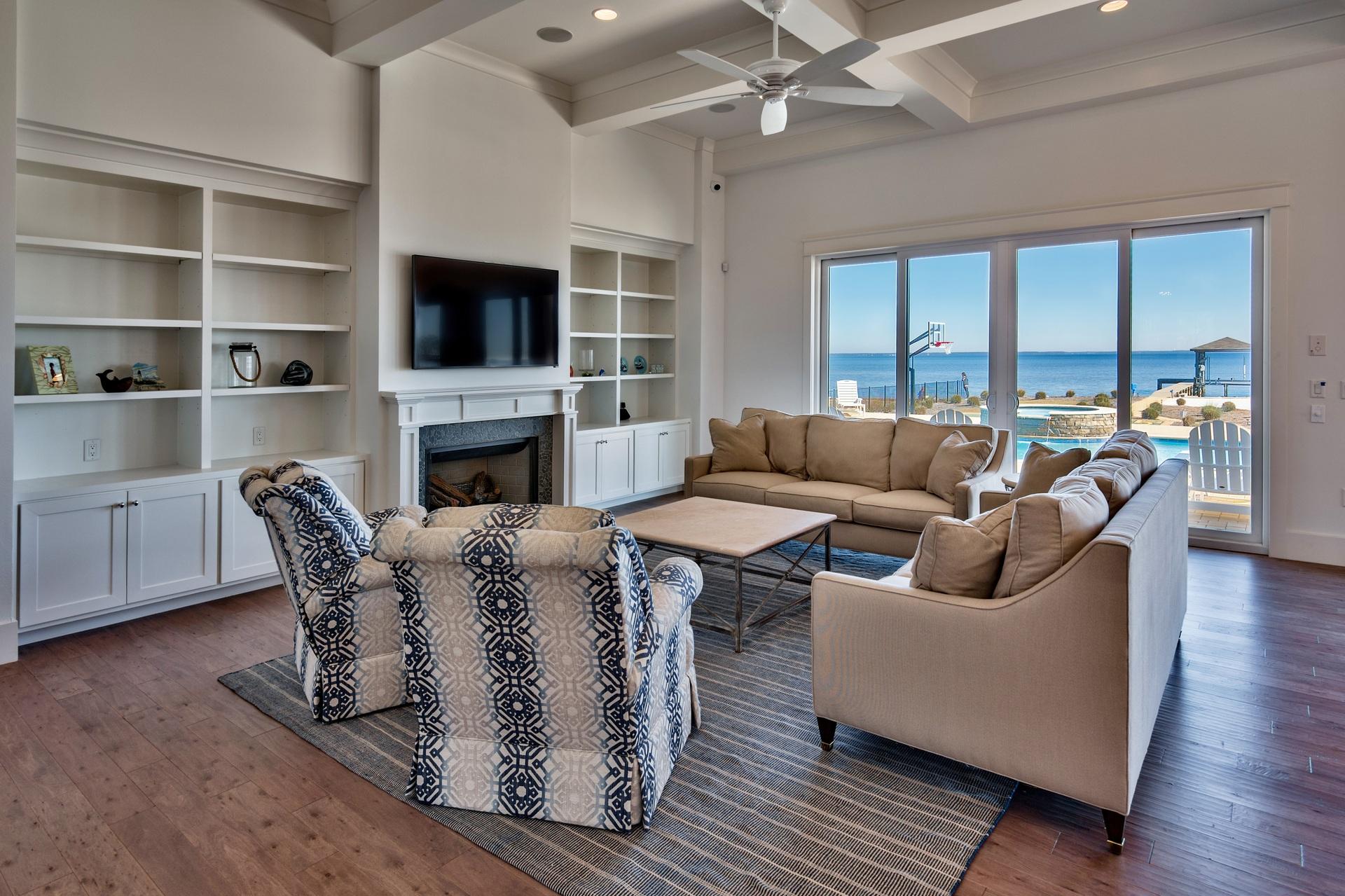 1591 Driftwood Point Road Santa Rosa Beach, FL 32459 - Photo 18 of 50 a living room with furniture fireplace and a flat screen tv