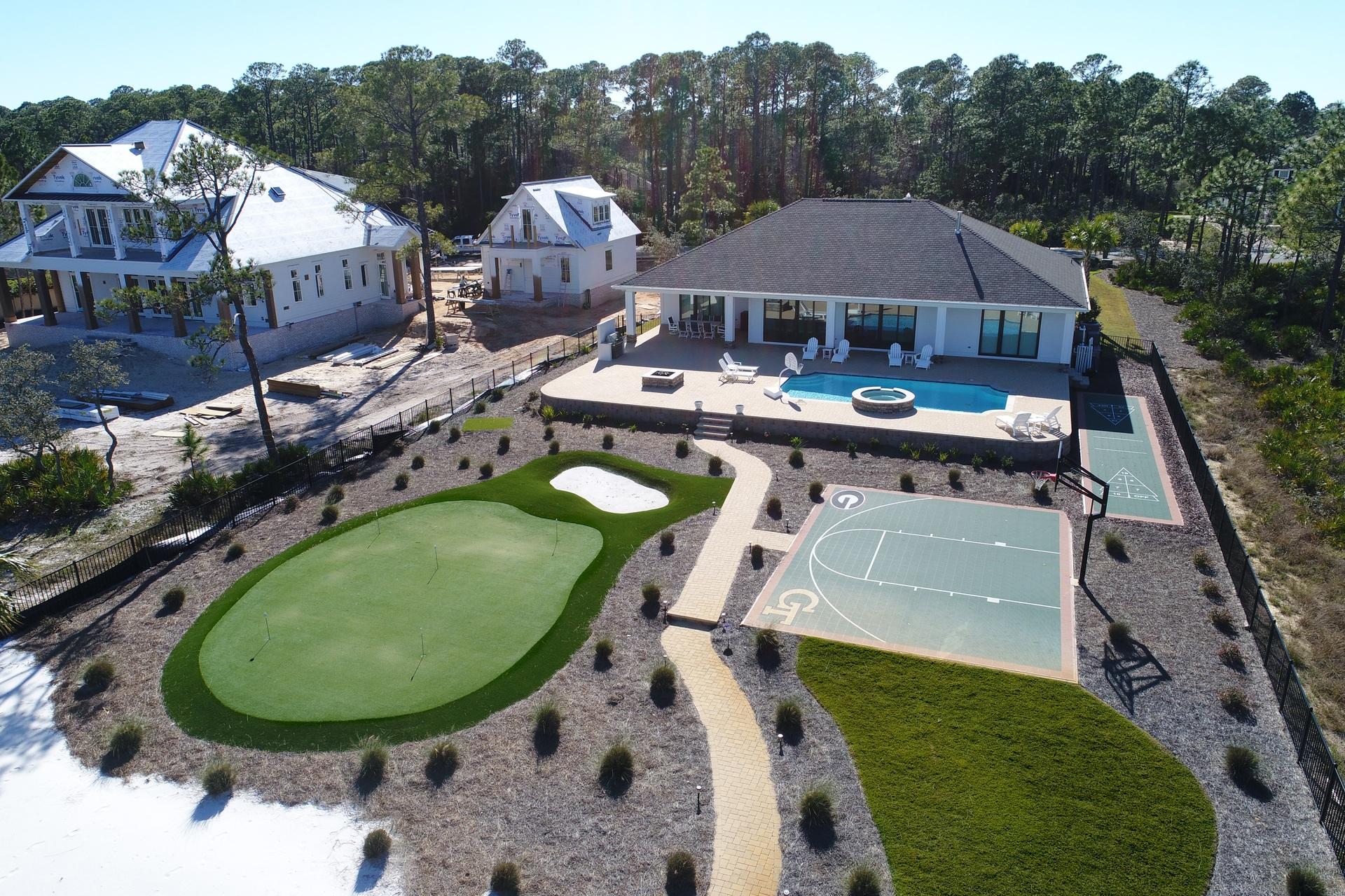 1591 Driftwood Point Road Santa Rosa Beach, FL 32459 - Photo 3 of 50 a view of a swimming pool with a patio