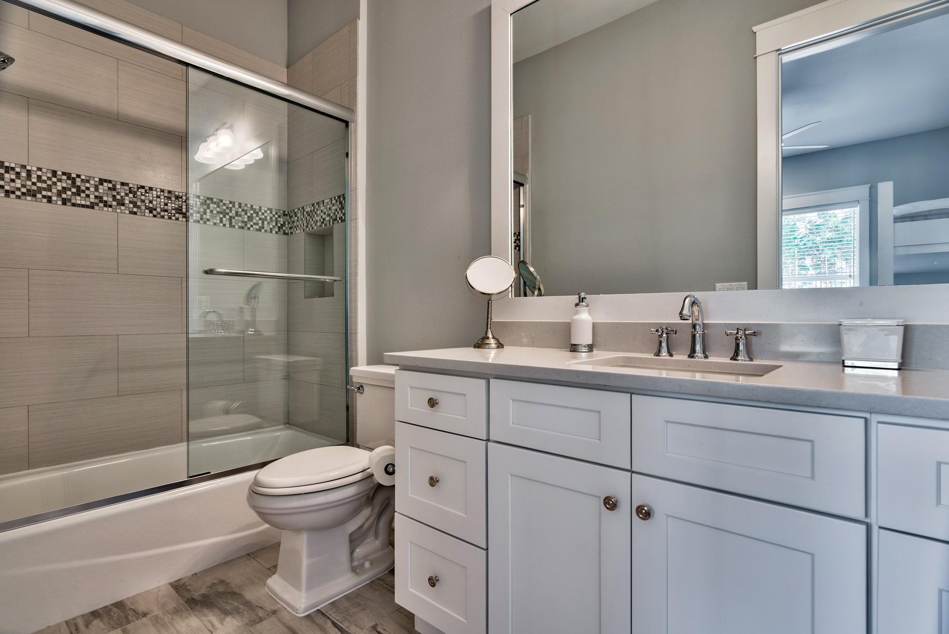 1591 Driftwood Point Road Santa Rosa Beach, FL 32459 - Photo 32 of 50 a bathroom with a sink toilet and shower