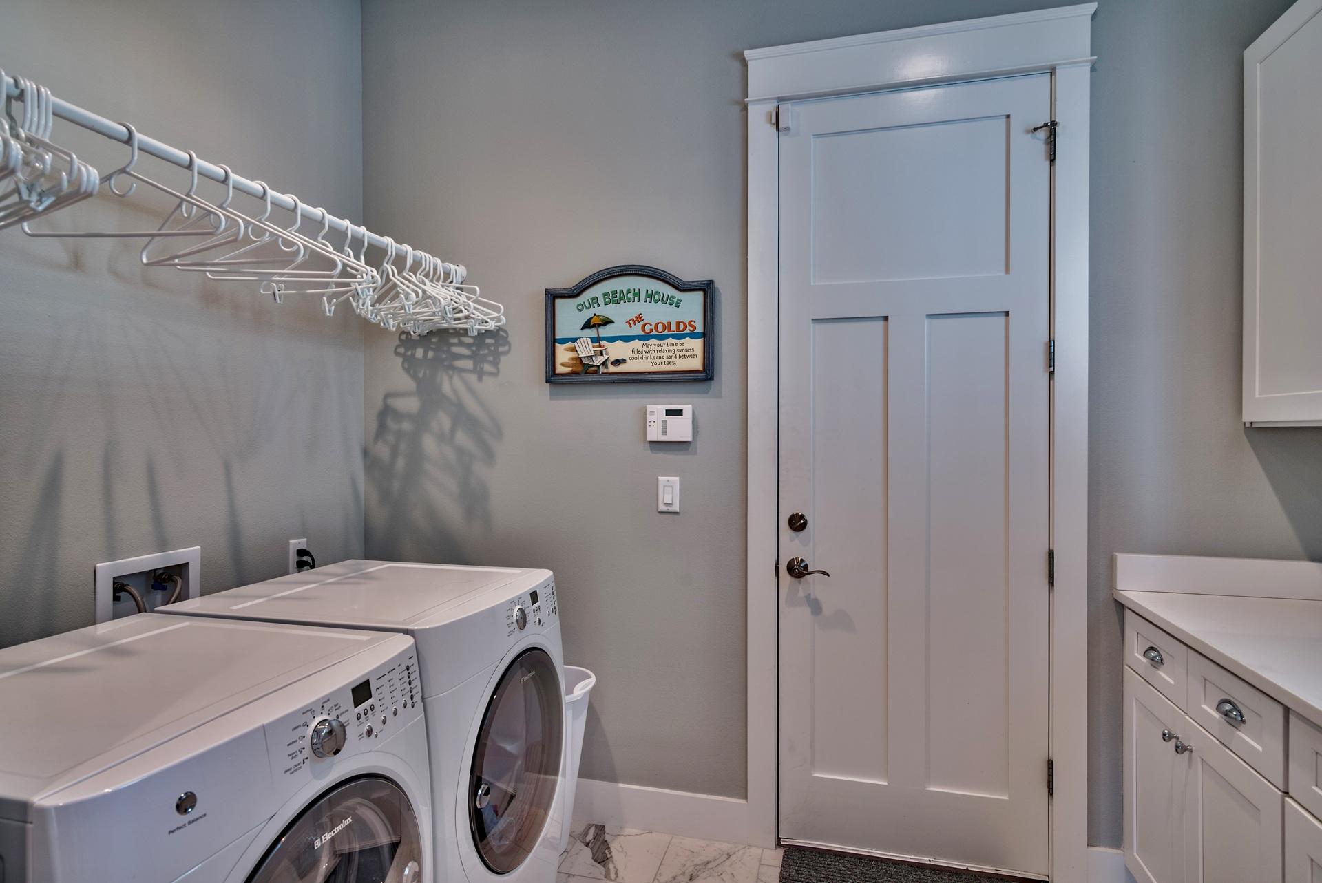 1591 Driftwood Point Road Santa Rosa Beach, FL 32459 - Photo 33 of 50 a utility room with dryer and washer