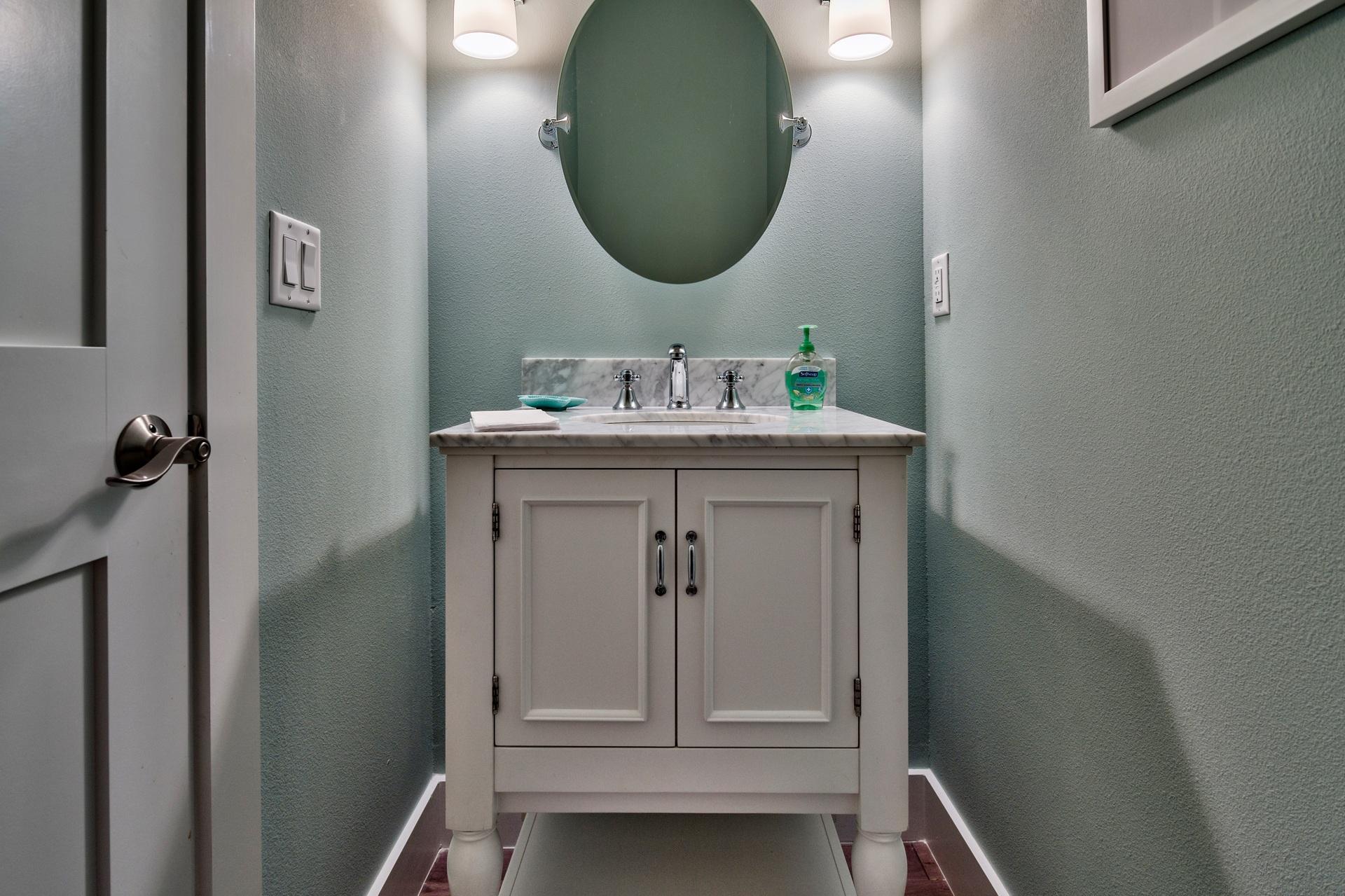 1591 Driftwood Point Road Santa Rosa Beach, FL 32459 - Photo 35 of 50 a bathroom with a granite countertop sink a mirror and vanity