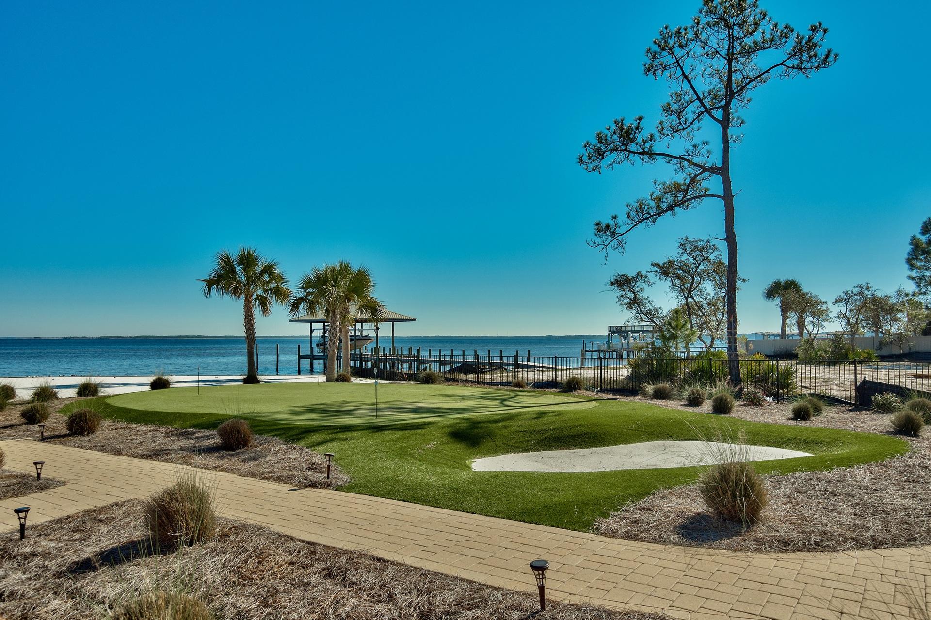 1591 Driftwood Point Road Santa Rosa Beach, FL 32459 - Photo 38 of 50 a view of a town with big trees and plants