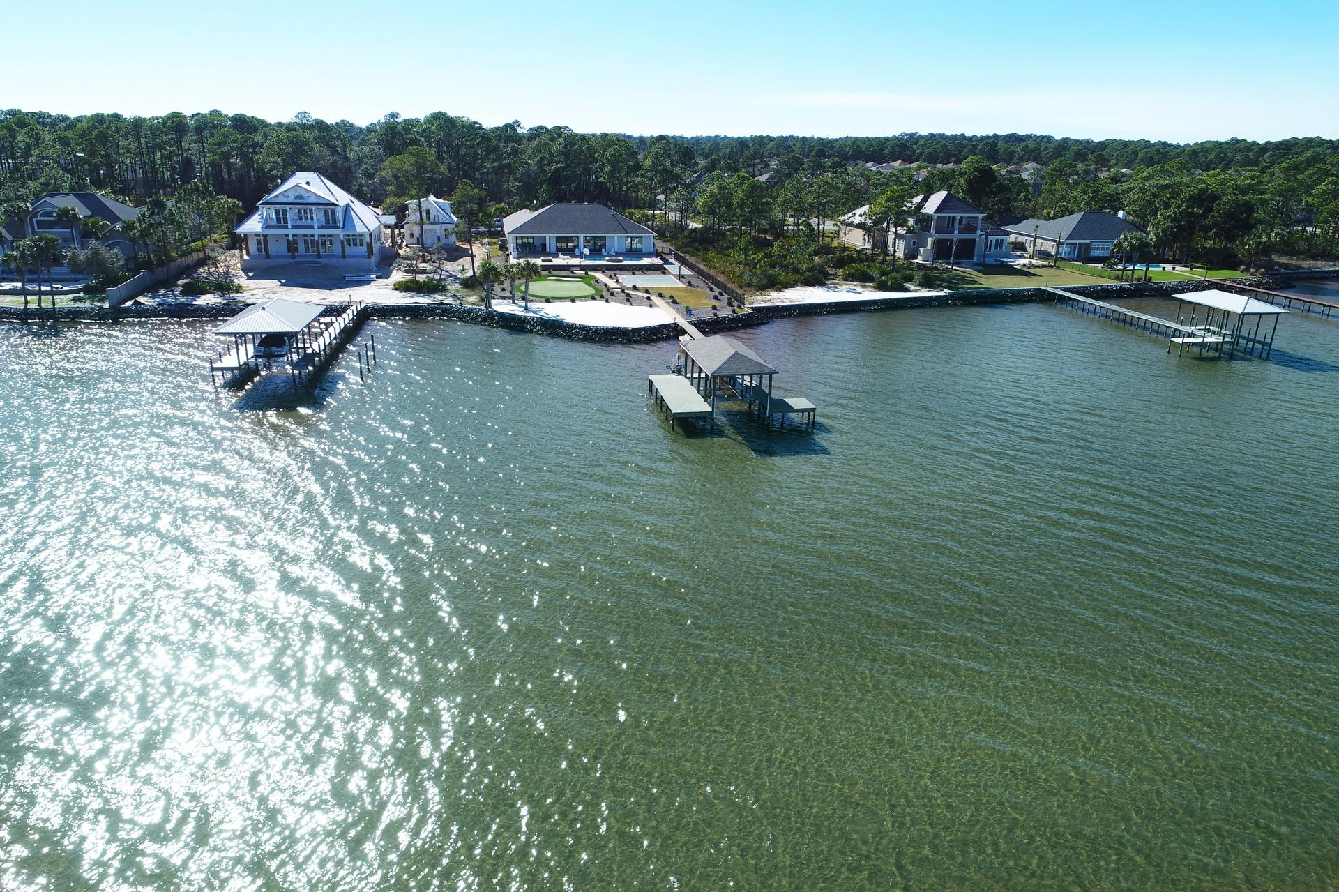 1591 Driftwood Point Road Santa Rosa Beach, FL 32459 - Photo 49 of 50 an aerial view of a house with a garden and lake view