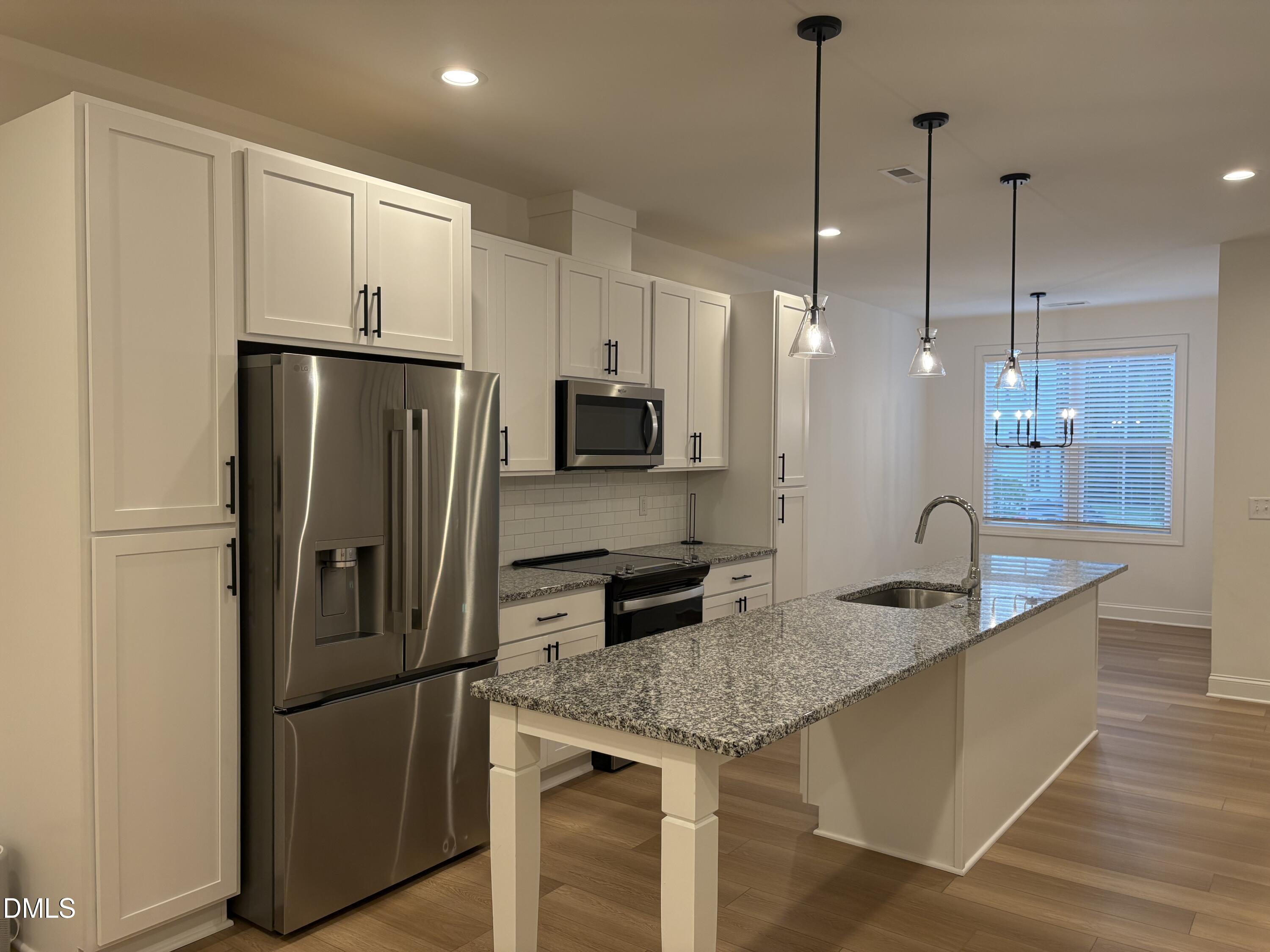 4801 Gossamer Lane, Unit 103 Raleigh, NC 27616 - Photo 5 of 17 Stainless appliances