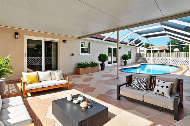 a outdoor living space with furniture and a potted plant