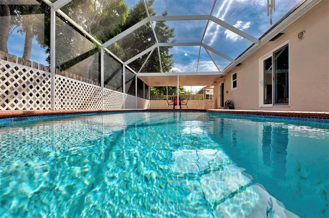 a view of a backyard of the house