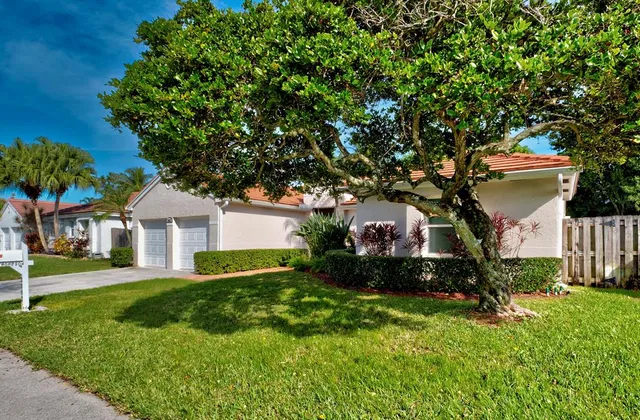 a house view with a garden space