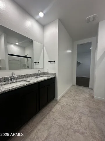 a white toilet sitting in a bathroom