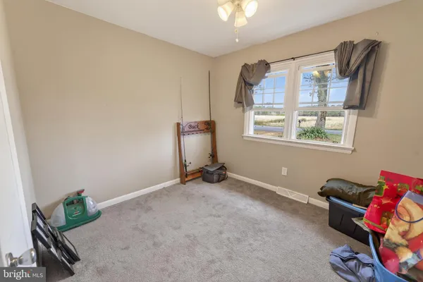 a room with toys and a dresser