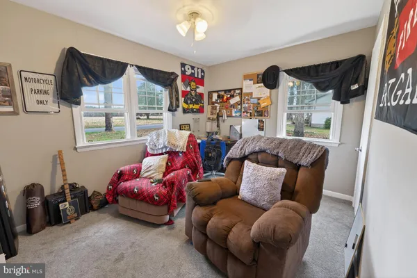 a bed room with a bed and a couch