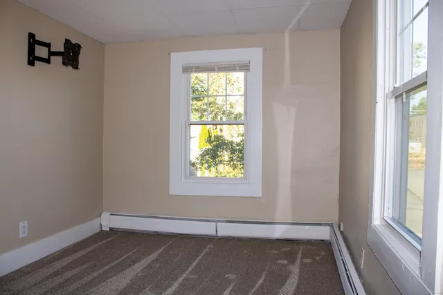an empty room with window