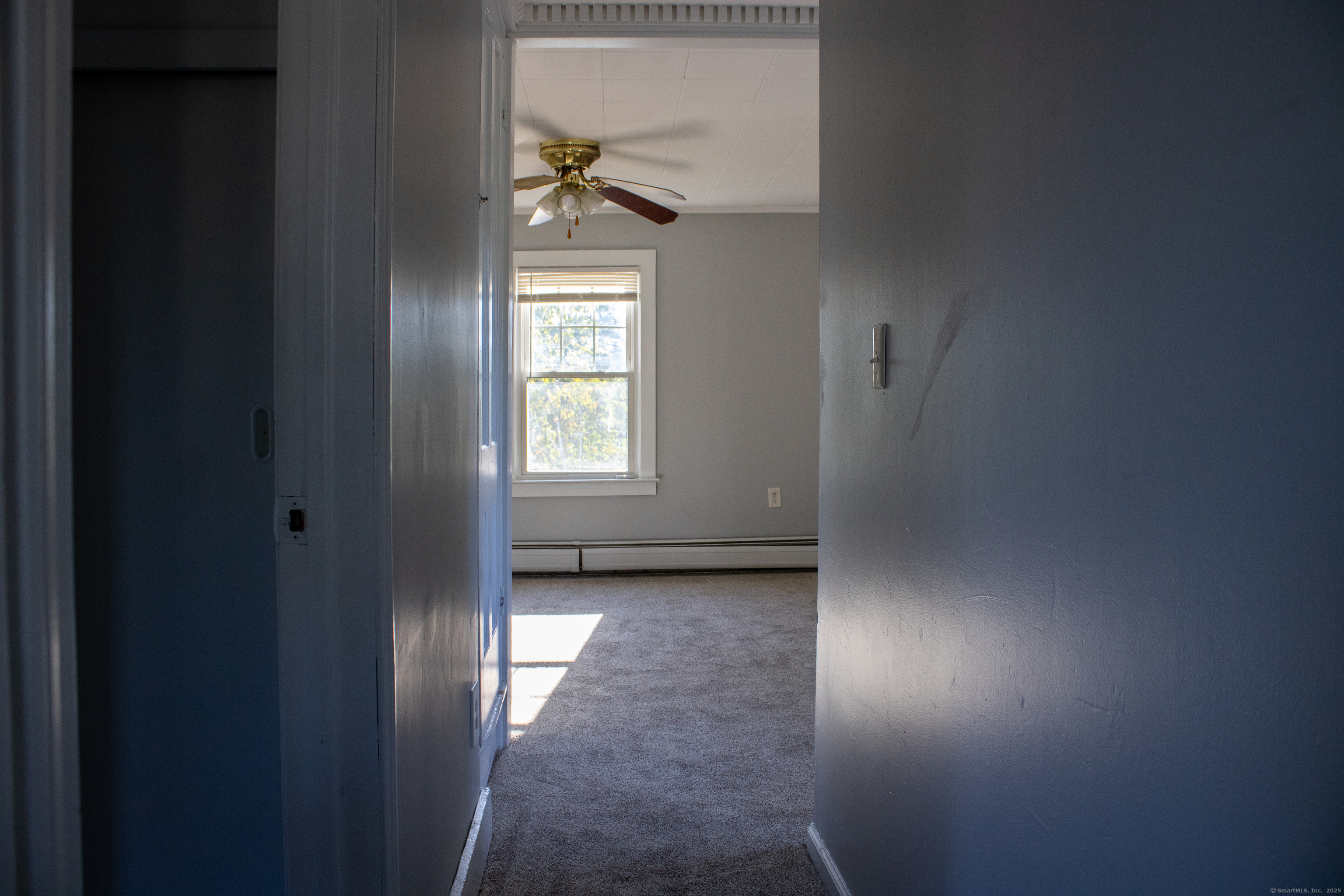 34 Fair Street Wallingford, CT 06492 - Photo 19 of 22 an empty room with windows