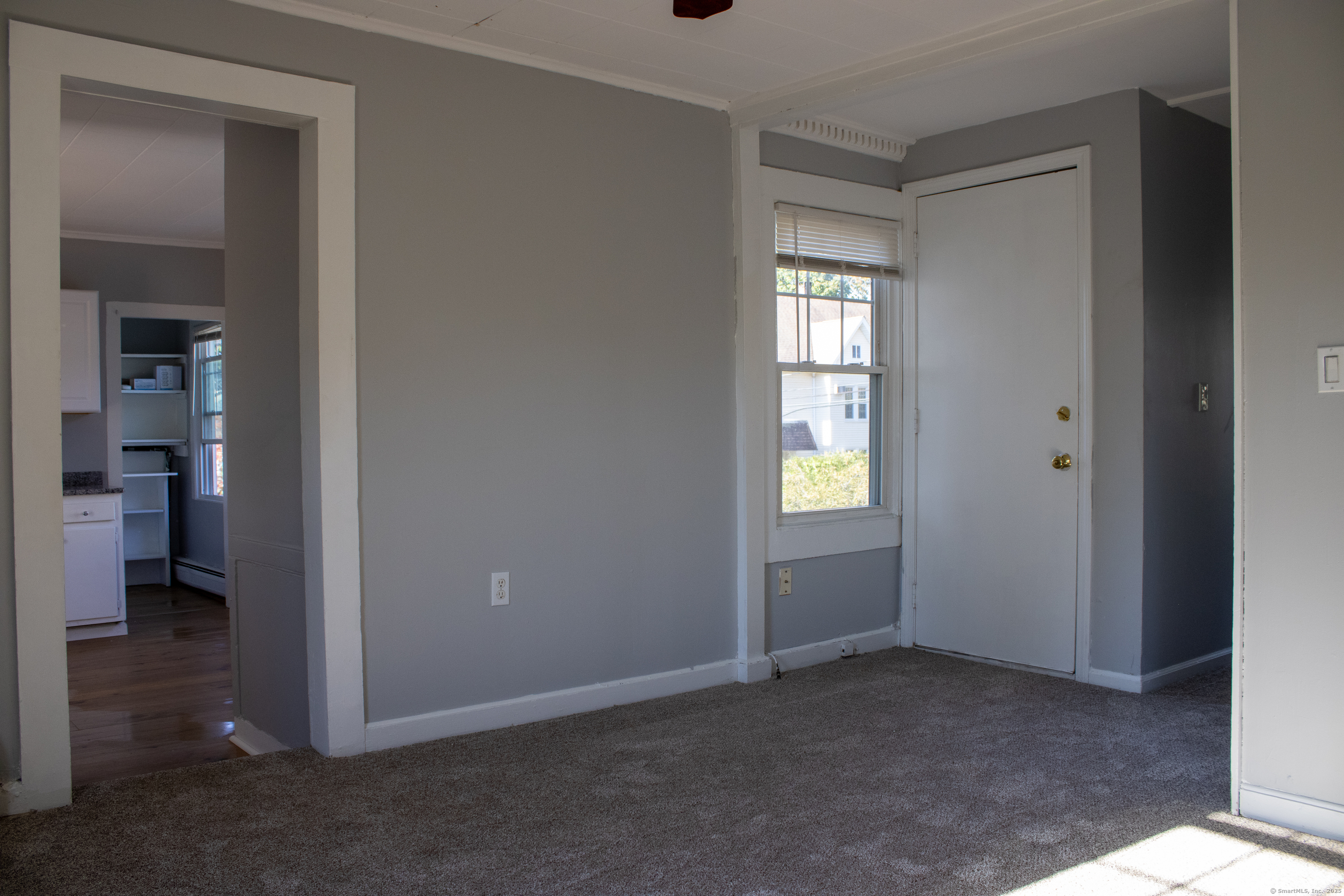34 Fair Street Wallingford, CT 06492 - Photo 8 of 22 an empty room that has a window in it